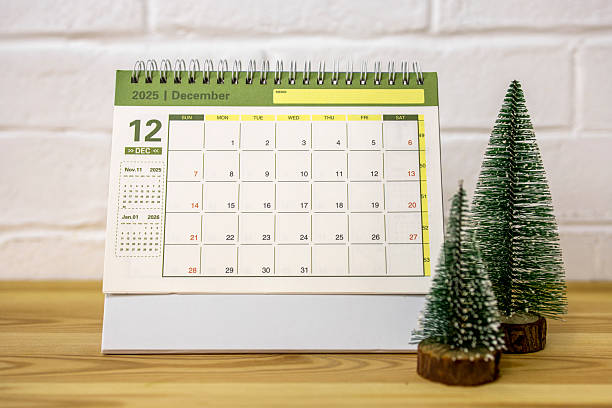 istock Hello, December 2025. A desktop calendar for planning on the table. 2234340711
