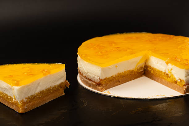 istock Orange cheesecake isolated on a white background. 2234341096