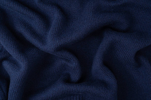 istock Navy blue merino wool sweater texture as background. Top view. 2234341131
