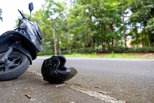 istock Motorcycle Accident Scene with Helmet 2234341552