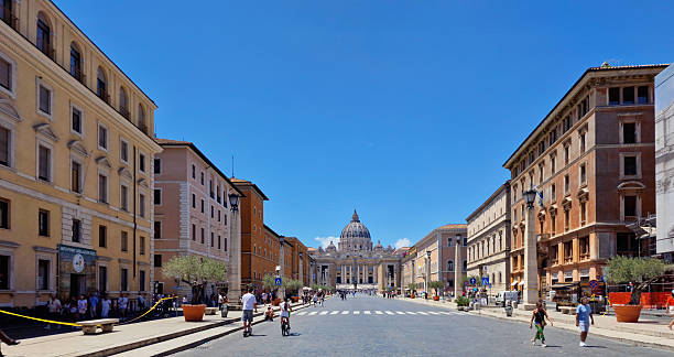 Vatican City - June 30, 2024: Vie delle Conciliazione connects Saint Peter's Square to the Castel Sant'Angelo. Taken towards St. Peter's Basilica.