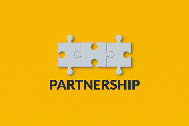 istock Partnership word near puzzle pieces. Teamwork concept. Strategic cooperation. Reliable partner. 3d render 2234342976