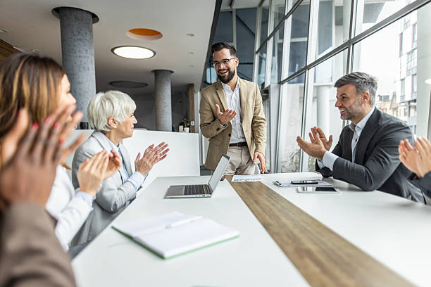 istock Business team applauding speaker after successful presentation in modern office 2234343898