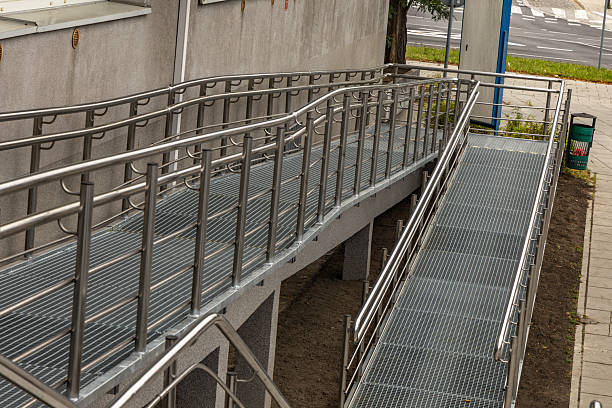 istock Accessible ramp for disabled people, metal ramp with handrails for strollers and disabled people, 2234346970