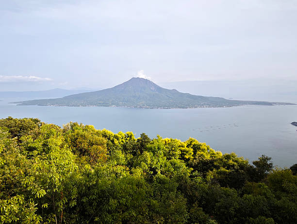 View at Terayama park of Sakurajima, an active stratovolcano overlooking Kagoshima bay, formerly an island and now a peninsula, Kagoshima Prefecture, Kyushu, Japan. It is the most active volcano in Japan.