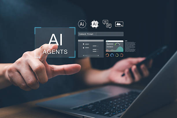 istock Hand pointing to virtual screen with text AI Agents above laptop, symbolizing artificial intelligence, machine learning, automation, data analysis, smart assistant, and digital business innovation. 2234350654