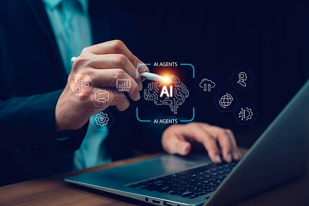 istock Businessman using laptop and digital pen with holographic AI agents interface. Concept of artificial intelligence assistant, data analytics, automation, business innovation, and future technology. 2234350656