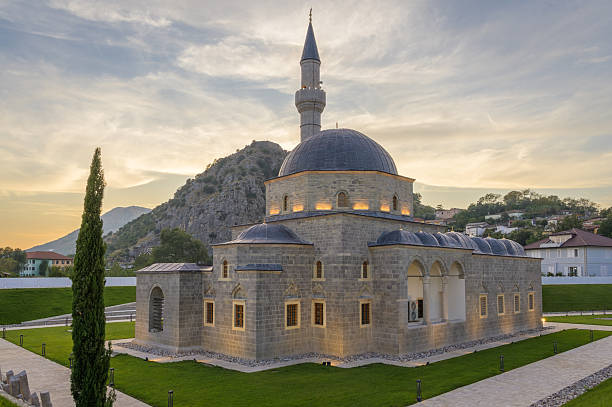Admire the Busatli Mehmet Pasha Mosque's stunning architecture at twilight.