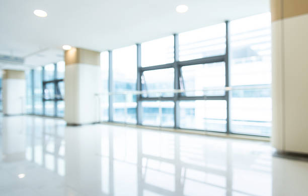 istock Blur background of empty corridor in modern hospital building 2234351899