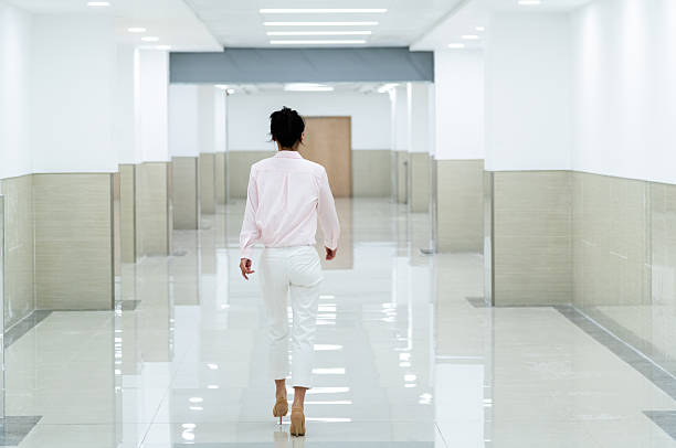istock Businesswoman walking on the corridor 2234351904