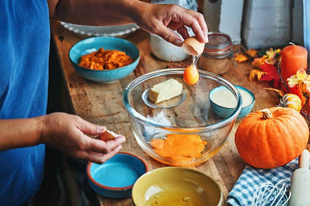 istock Preparing Pumpkin Pie for the Holidays in Domestic Kitchen 2234357793