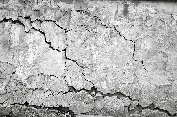 istock Texture cracked ruined gray wall background with grunge plaster 2234359106