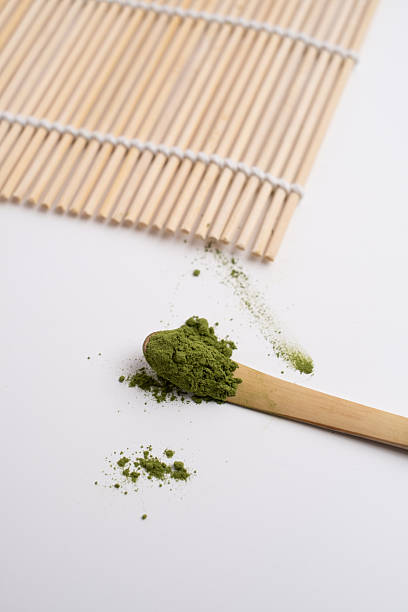 istock Green matcha close-up. Chasen, bamboo whisk. Traditional tools for making matcha. Matcha powder. Making matcha, recipe. 2234359635