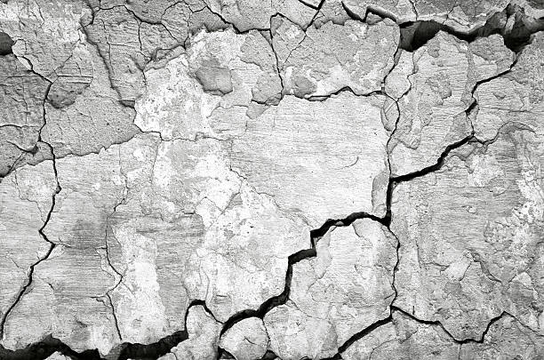 istock Texture cracked ruined gray wall background with grunge plaster 2234362166