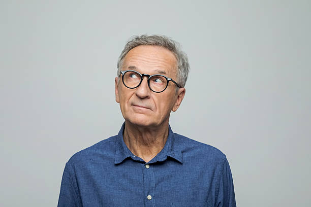 istock Headshot of thoughtful senior man 2234362325