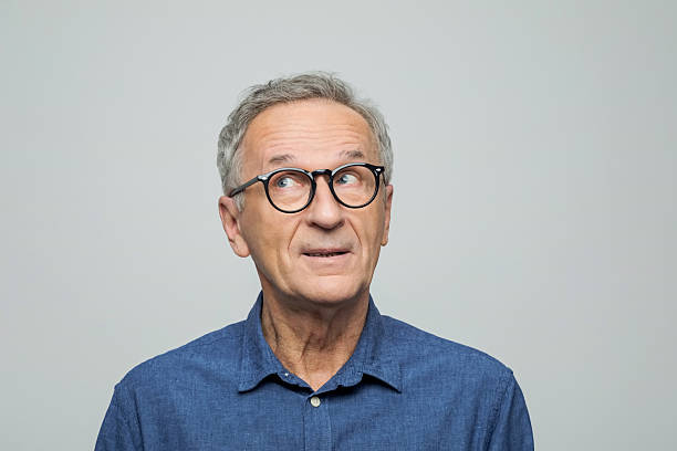 istock Headshot of thoughtful senior man 2234363484