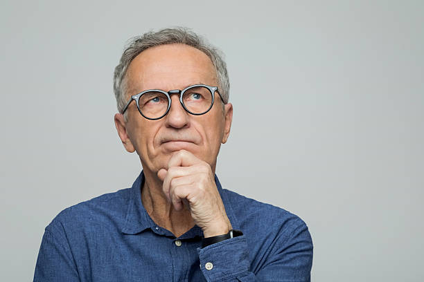istock Headshot of thoughtful senior man 2234363577
