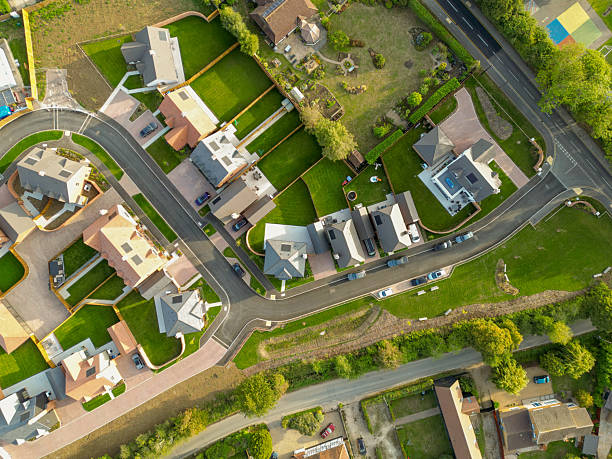 istock Drone top down view of newly purchased homes seen in a British housing development site. 2234363703