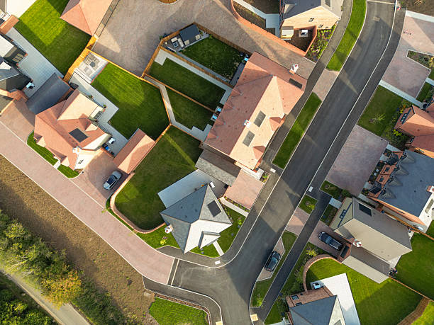 istock Drone top down view of a newly competed housing development, catering for both affordable, first time buyers and larger executive homes. 2234363937