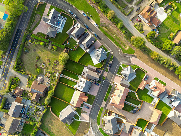 istock Drone top down view of newly purchased homes seen in a British housing development site. 2234364020