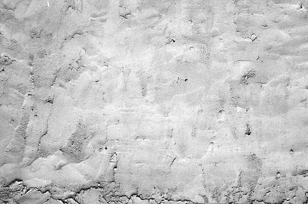 Texture cracked gray wall background with grunge plaster, full frame