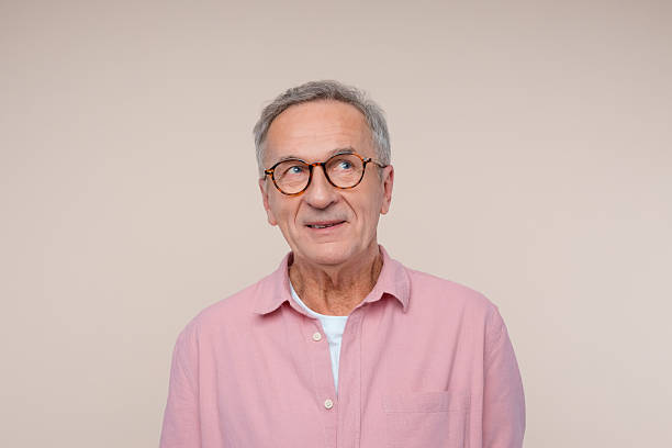 istock Portrait of surprised senior man 2234364551