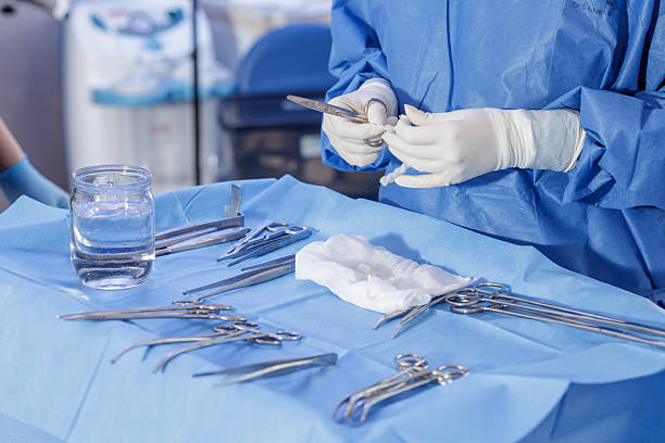 Wide view of a modern operating room equipped with surgical tools, advanced medical devices, and sterile environment. Image represents real hospital conditions and professional healthcare setup.