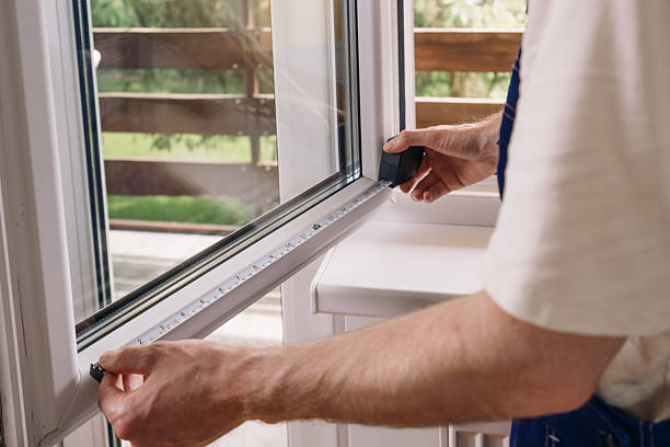 istock Repairman measures PVC window frame for home installation 2234375305