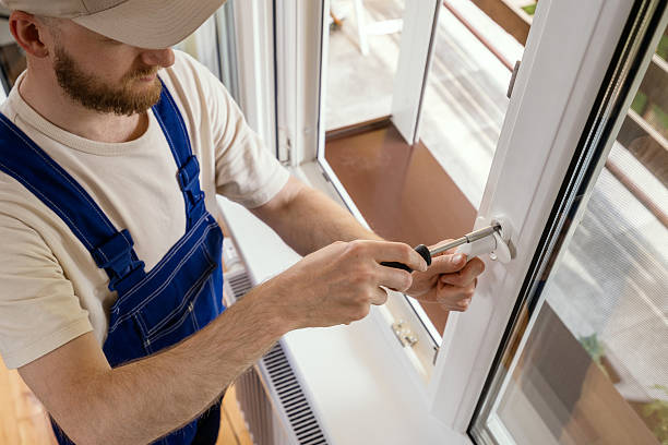 istock Repairman installs a PVC window frame for energy-efficient home improvement 2234375306