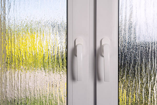 istock Modern PVC window frame with clear glass and textured surface in residential setting 2234375327