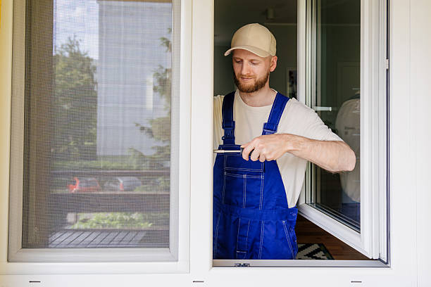 istock Repairman installs energy-efficient PVC window frame for residential space 2234375745