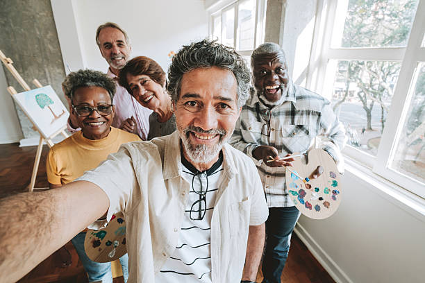 istock Teacher taking a selfie with painting students 2234378826