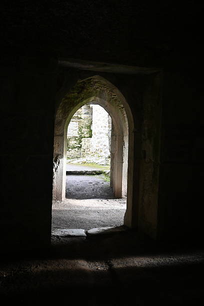 istock A Beautiful Window View Through An Enigmatic Ancient Stone Structure, Rich in History and Texture 2234381080
