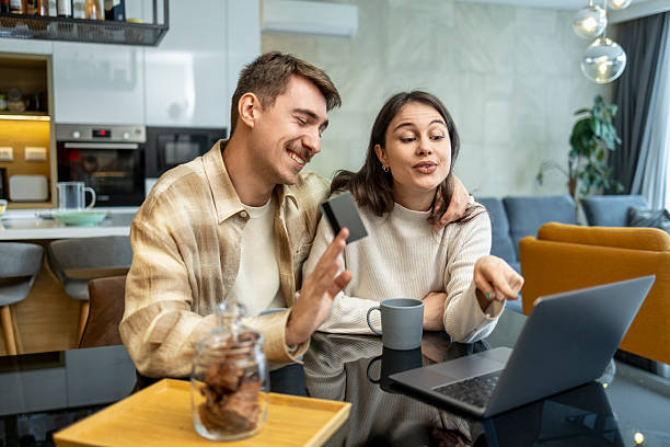 istock Couple enjoying a cozy moment while planning their day in a stylish kitchen 2234381172