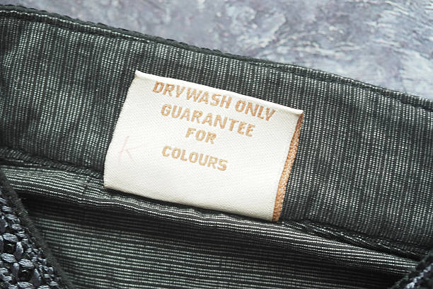 istock Care label instructions for garment emphasizing color preservation 2234385700