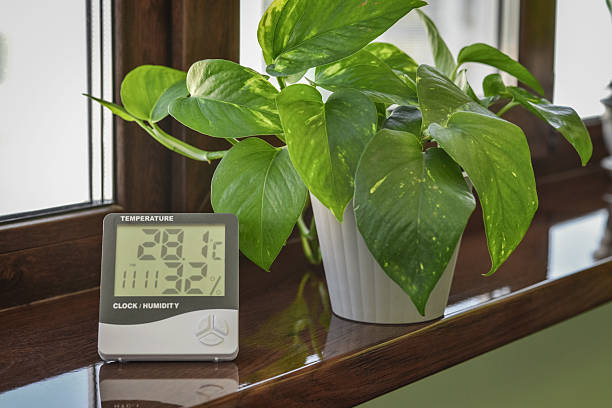 istock Thermometer hygrometer measuring the optimum temperature and humidity in a house 2234386021
