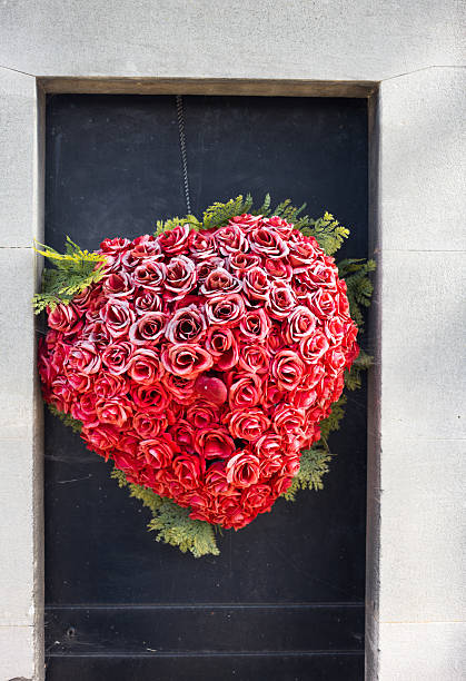 istock Paris, France: Wreath Red Roses on Black Grave, Montparnasse Cemetery 2234406133