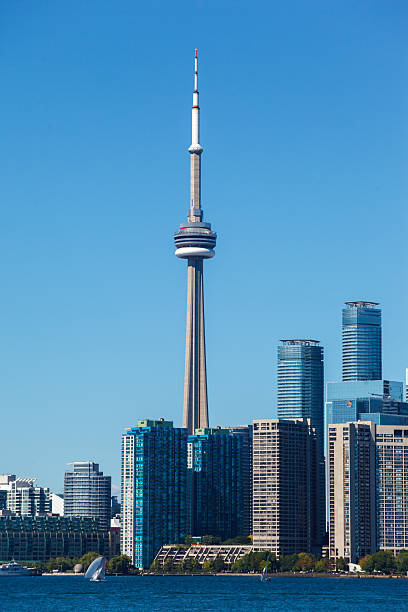 The CN Tower Toronto skyscraper high building, and the skyline. Ontario Lake, Ontario, Canada
