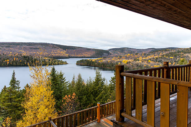 istock Scenic Lake View from a Rustic Cabin in Autumn Landscape 2234409169