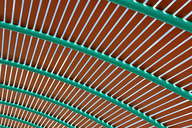 Brown panels intersected by green curved beams abstract textured background