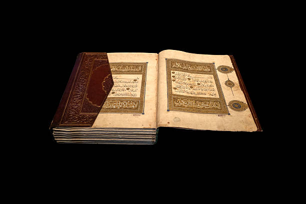 istock Ancient illuminated Quran manuscript with ornate calligraphy and leather binding 2234418638