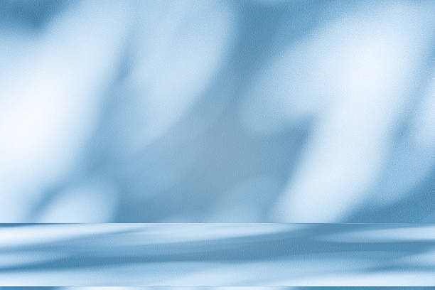 istock Studio style background wall decoration presentation uses white and blue tones. with shadows cast from a nearby window, concept creating a decorative 2234421562
