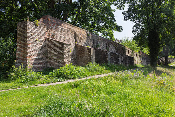 istock An ancient brick wall structure, part of old city fortifications, Amersfoort. 2234422219