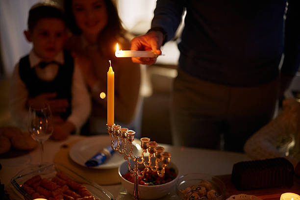 istock Lightning candles on Menorah during Hanukkah celebration! 2234430473