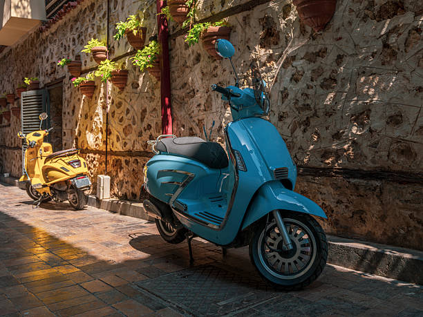 istock Blue motorcycle on an old street 2234432514