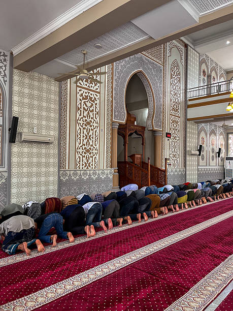 istock Muslim Worshippers Praying in Mosque Interior 2234432817