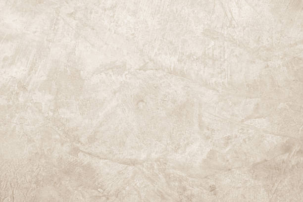 istock Concrete wall texture background. Close up retro plain cream color cement wall background texture. 2234435575