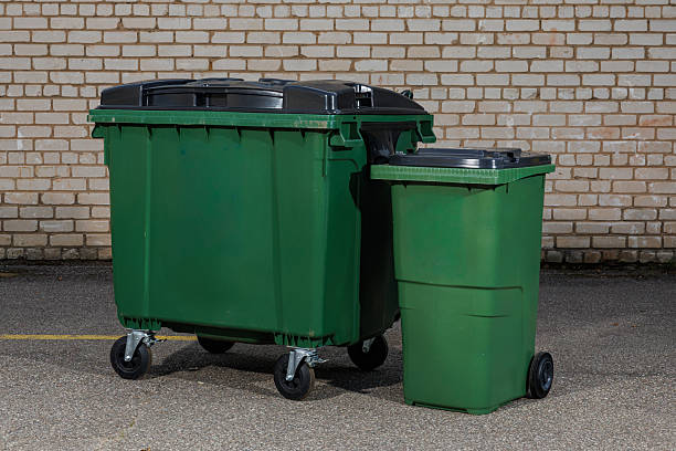 istock Large and Small Green Recycling Bins with Black Lids 2234436692