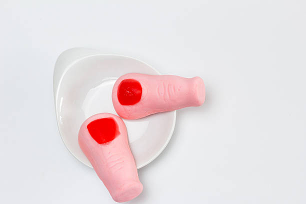 White plastic hand model printed with innovative 3d printing technology showing five fingers