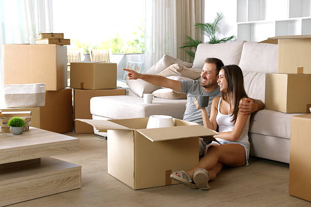 istock Couple moving home planning renovation together 2234439236